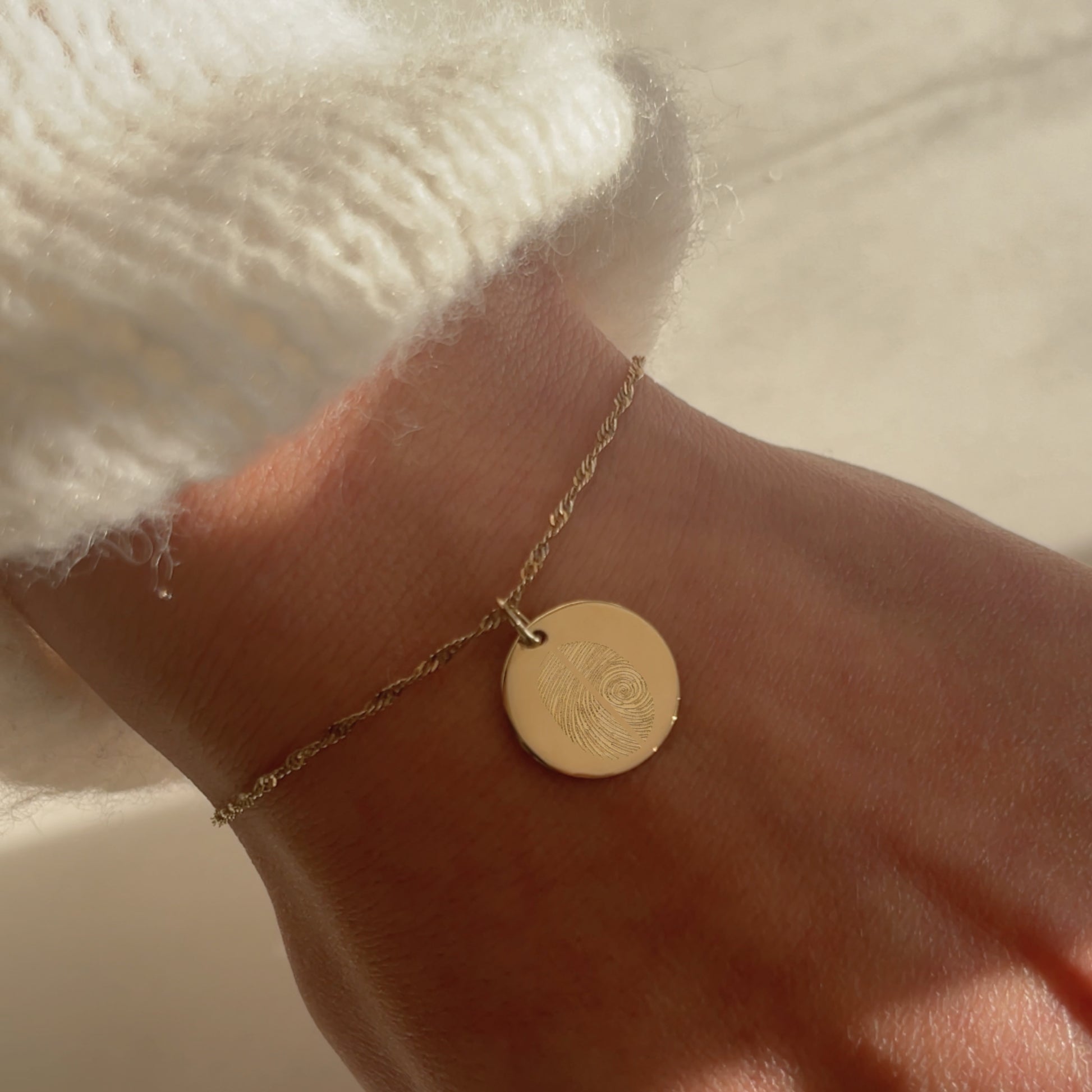 10K solid gold Actual Two Fingerprint Personalized Memorial Engraved Twisted Chain Bracelet on woman's wrist