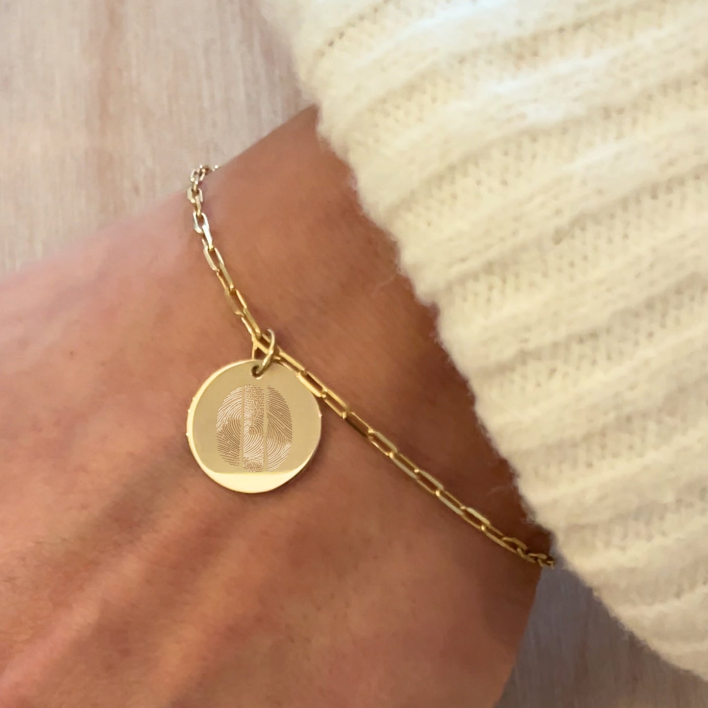 Woman wearing a 10K solid gold Actual Three Fingerprint Custom Memorial Engraved Paperclip Bracelet