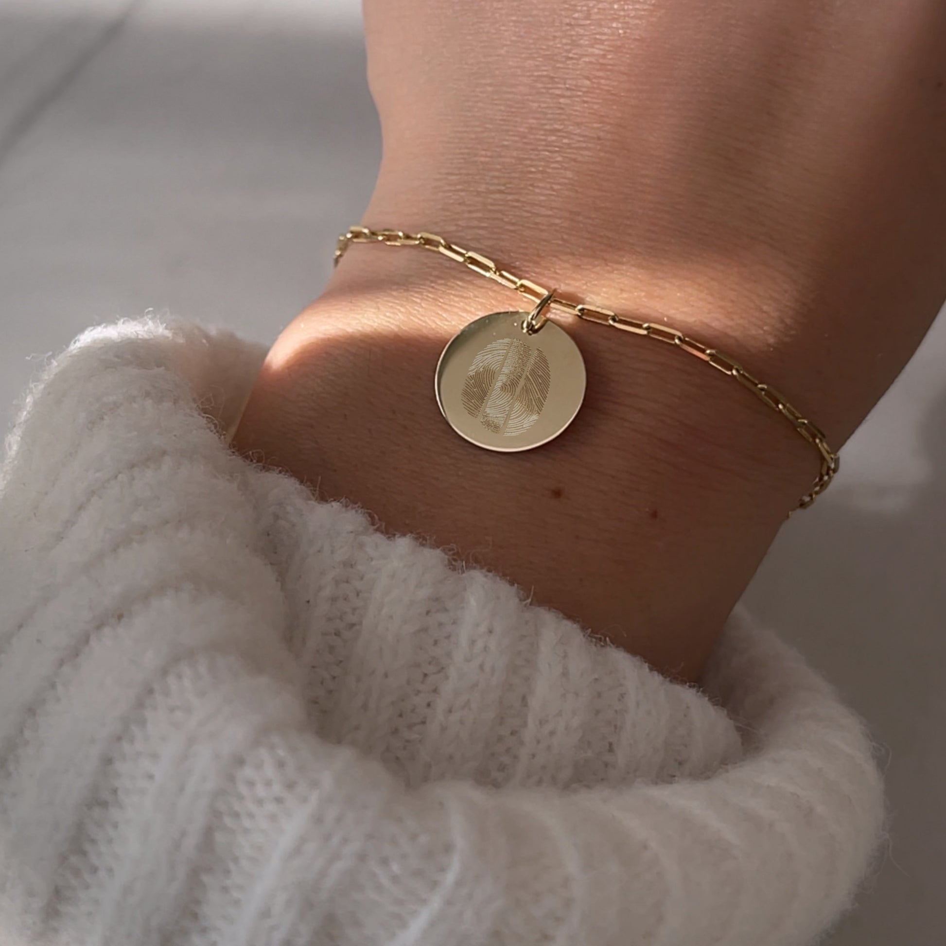 Woman wearing a 10K solid gold Actual Three Fingerprint Personalized Custom Memorial Engraved Paperclip Bracelet