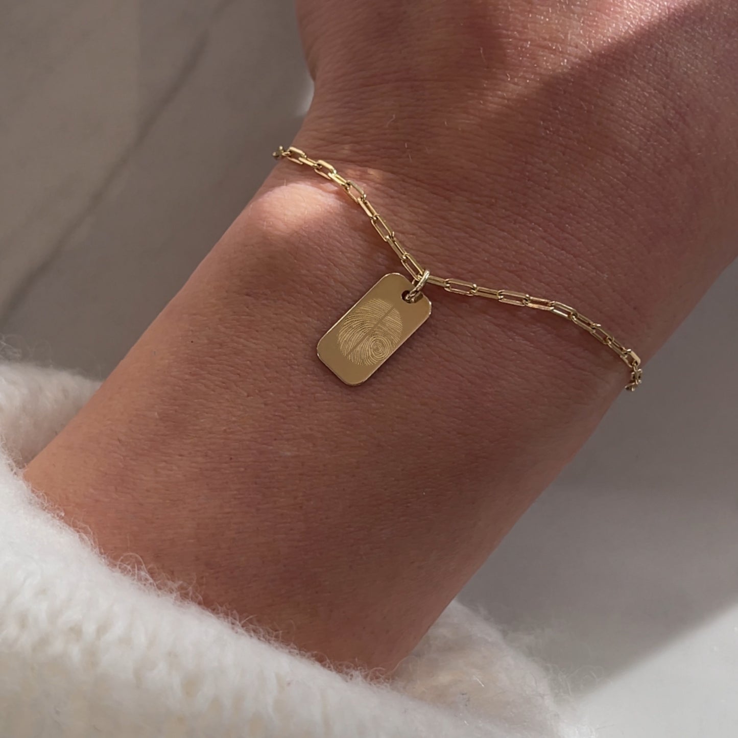 woman wearing 10K solid gold Actual Two Fingerprint Personalized Engraved Rectangle Paperclip Bracelet
