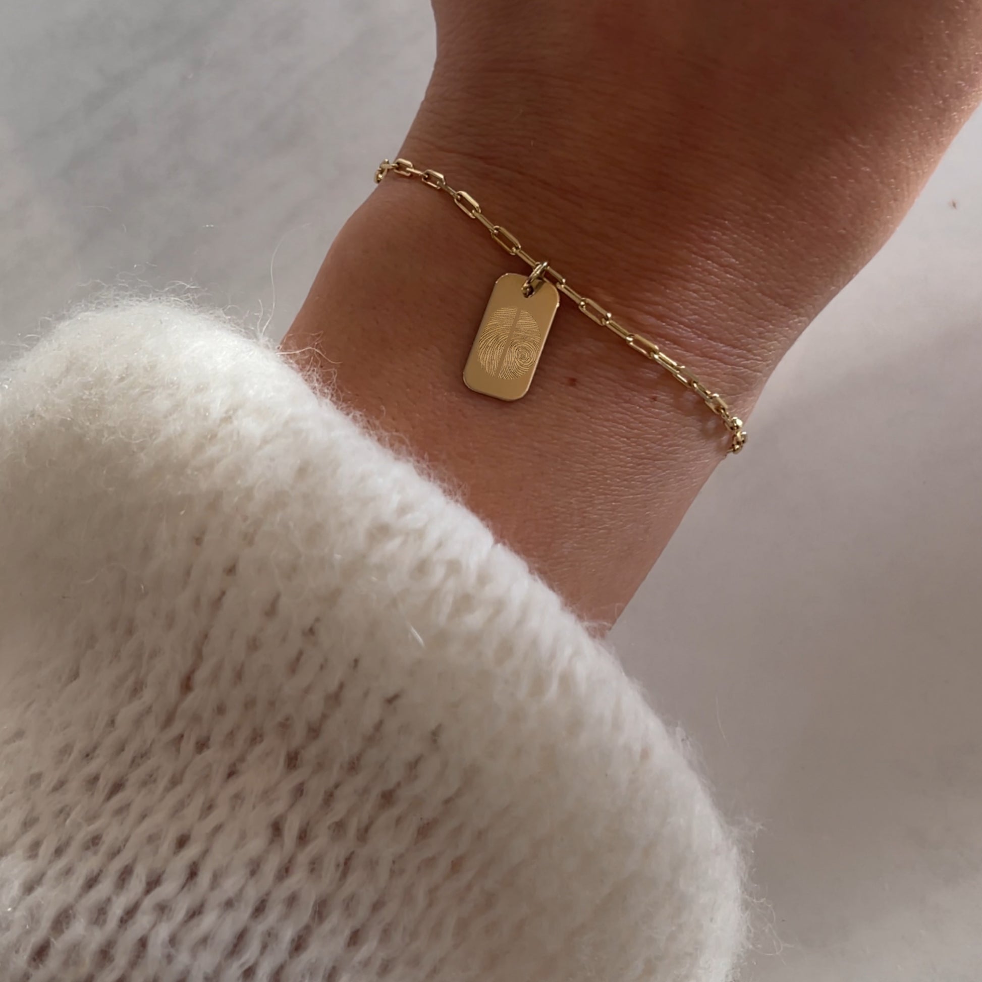 woman wearing 10K solid gold Actual Two Fingerprint Personalized Engraved Rectangle Paperclip Bracelet