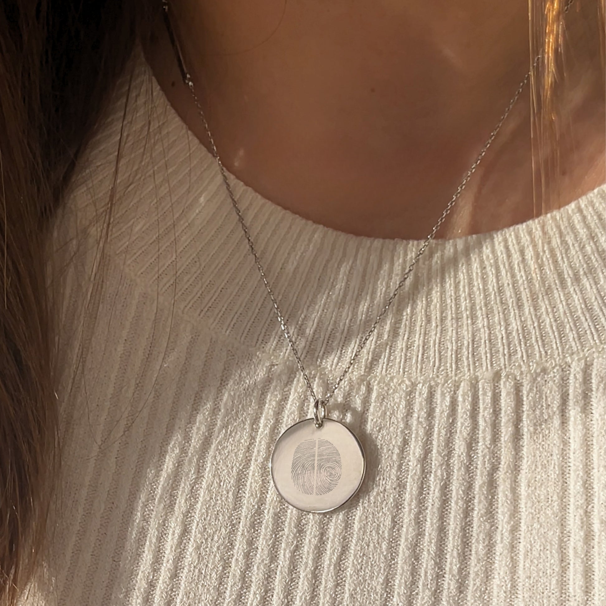 woman wearing 925 Sterling Silver Actual Two Fingerprint Personalized Custom Memorial Engraved Pendant