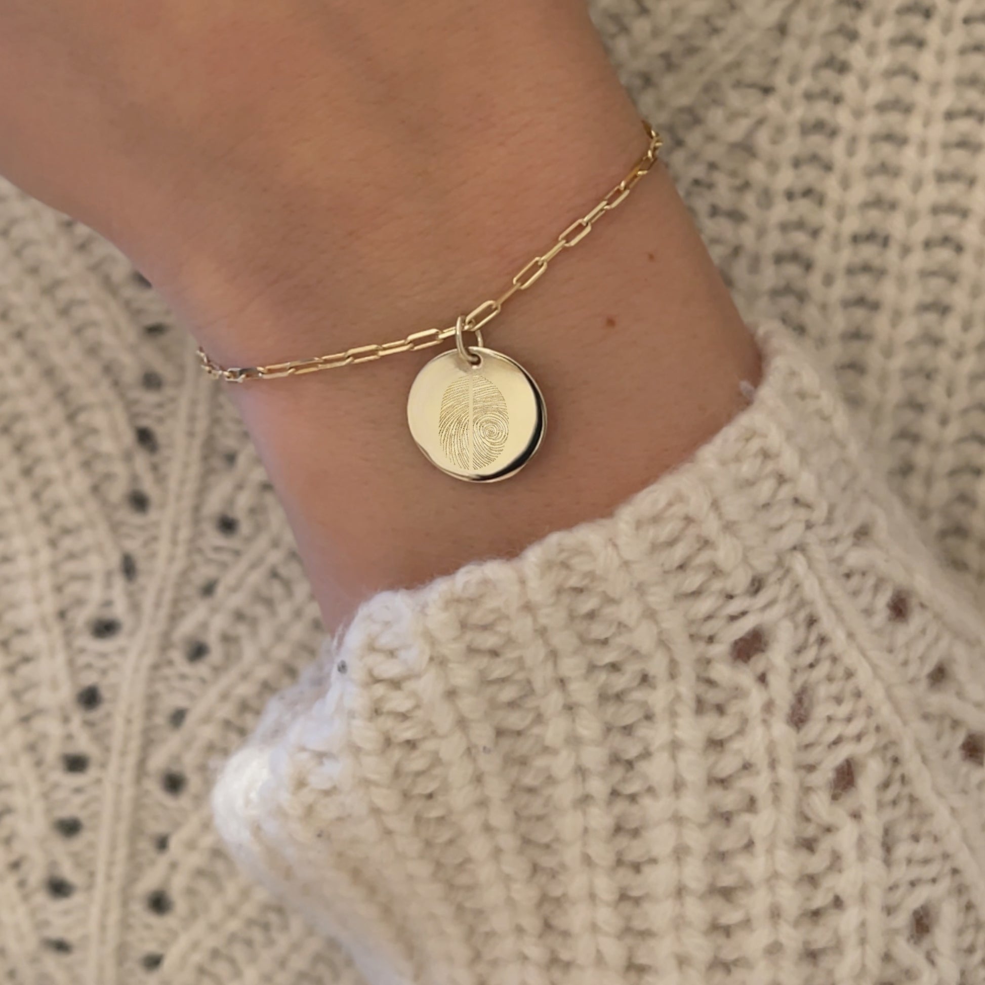 woman wearing Woman wearing a 10K solid gold Actual Two Fingerprint Custom Memorial Engraved Paperclip Bracelet