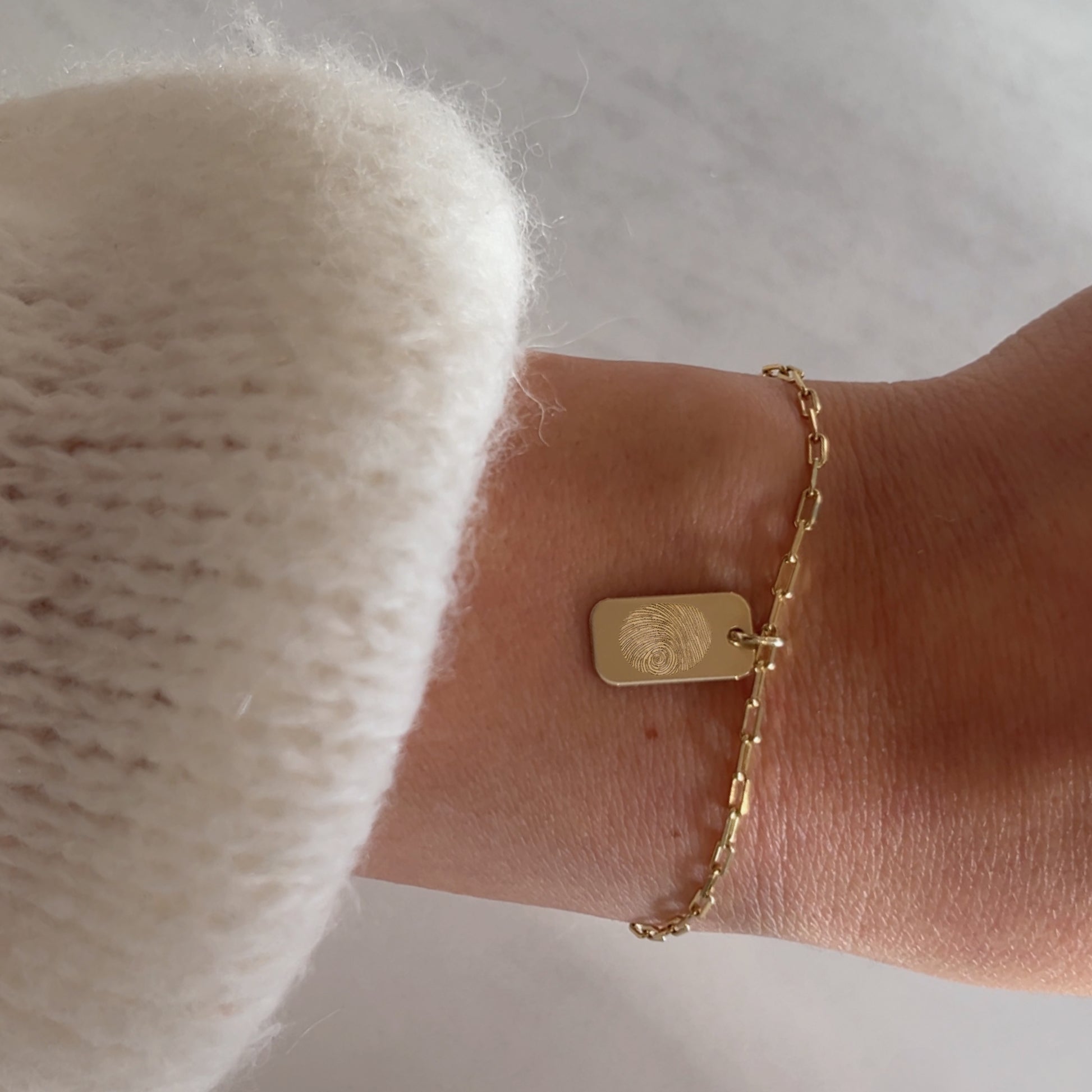 woman wearing a 10k solid gold Actual Fingerprint Personalized Paperclip Bracelet