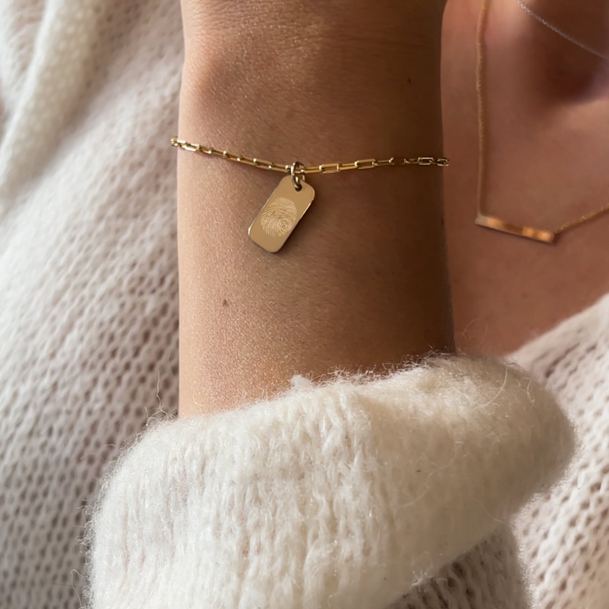 woman wearing woman wearing a 10K solid gold Actual Fingerprint Personalized Custom Engraved Rectangle Paperclip Bracelet