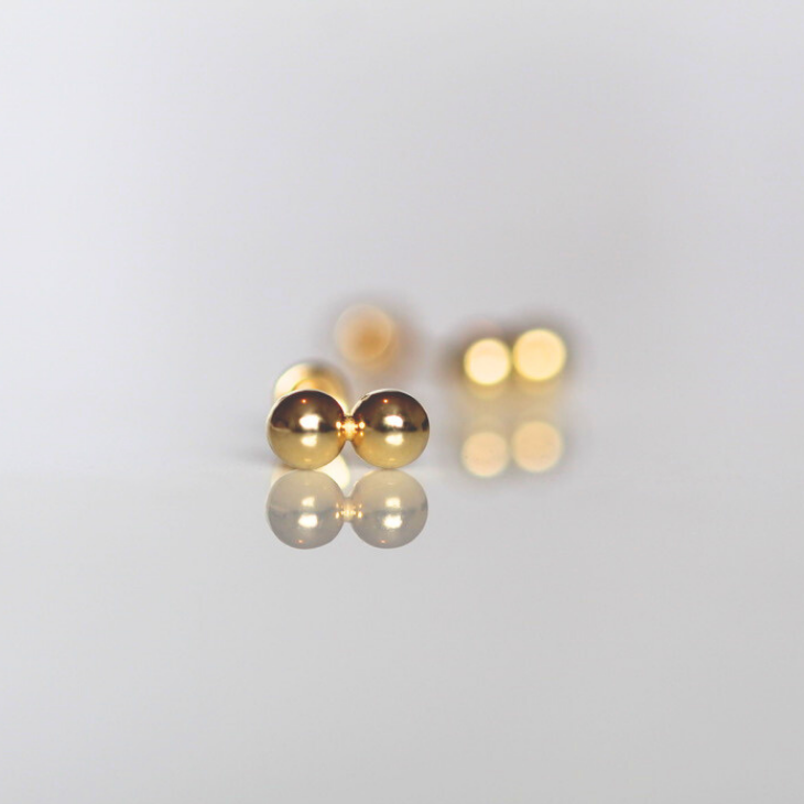 Mini clous d'oreilles à double sphère
