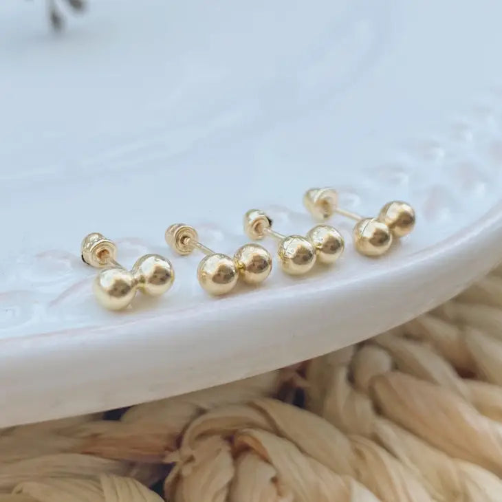 Mini clous d'oreilles à double sphère