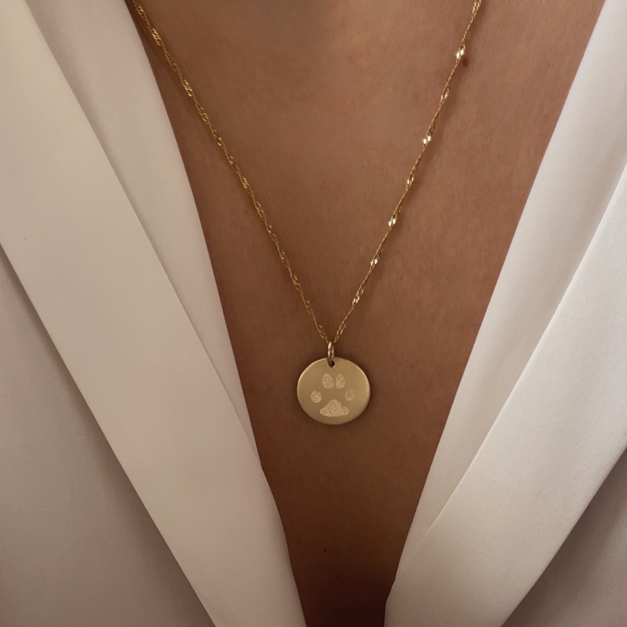 Le pendentif empreinte de patte 
